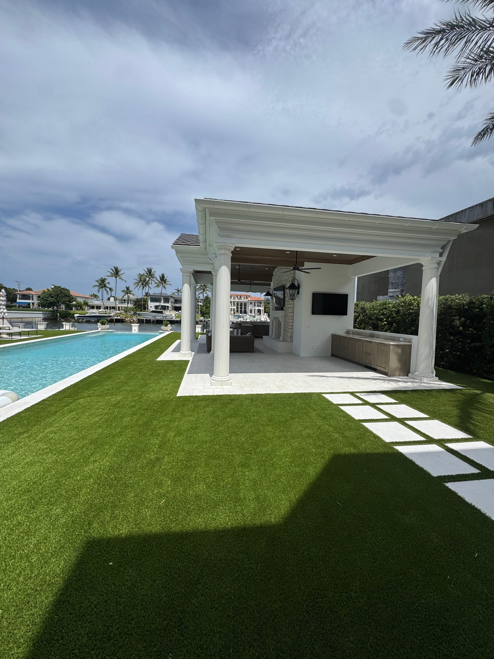 Waterfront backyard and pool area detailed
