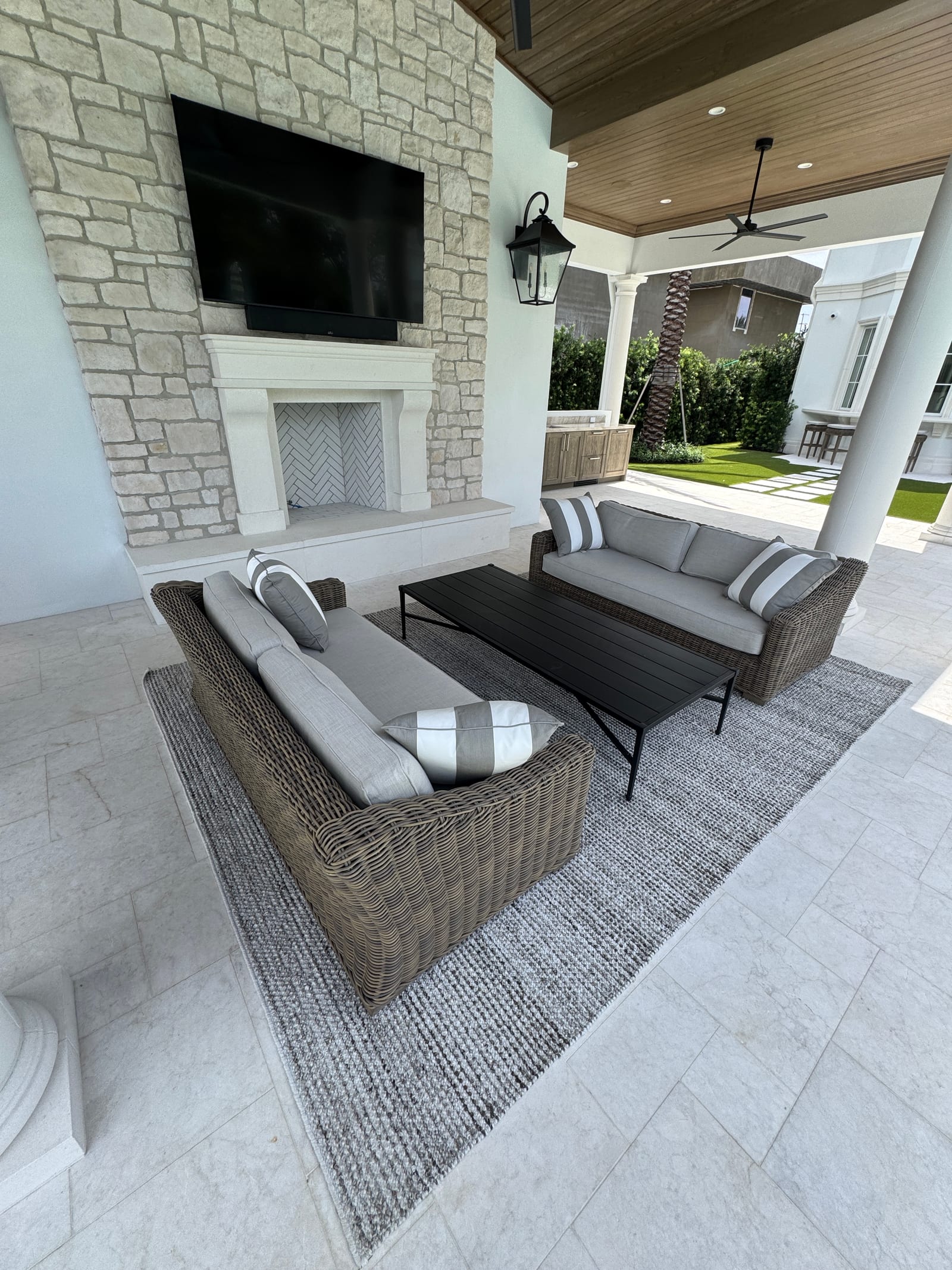 Outdoor lounge and fireplace area cleaned and staged